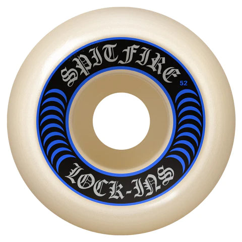 A single Spitfire skateboard wheel with blue and black text on a white background.