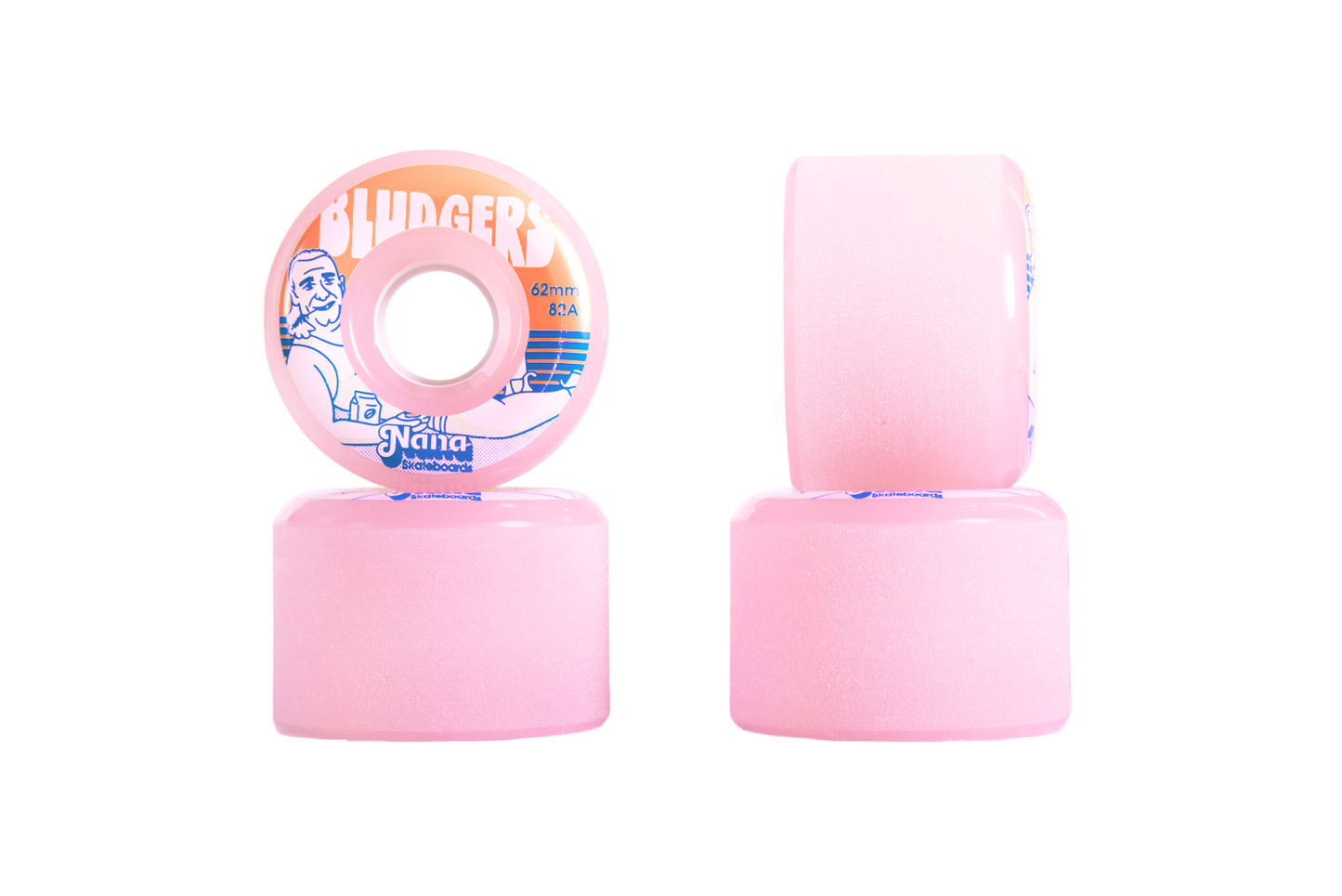 Four pink Nana Bludgers skateboard wheels stacked two by two, with the top wheel facing up and the bottom wheel facing sideways. The wheels have a stoneground surface and are labeled with 'Bludgers' and 'Sippin' on the top wheel.