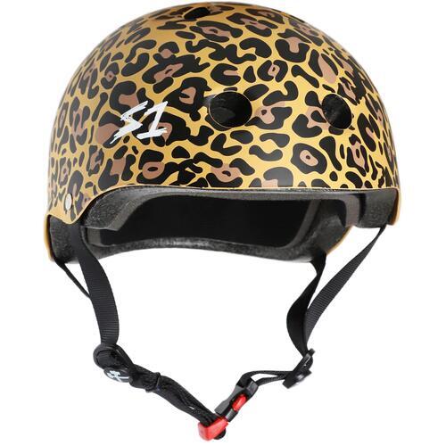 A youth-sized helmet with a leopard print pattern, featuring a chin strap and adjustable straps.