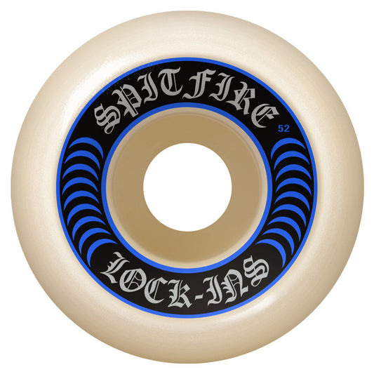 A single Spitfire skateboard wheel with blue and black branding.