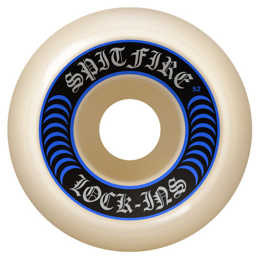 A single Spitfire Formula Four Lock-Ins Skateboard Wheel, 52mm 99a, with a white base color and black and blue graphics on it.