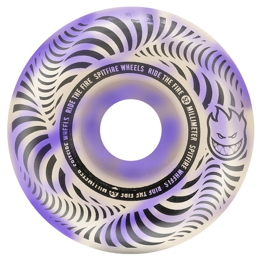 A skateboard wheel with a swirl pattern, predominantly white with purple and black accents, and the Spitfire brand logo.
