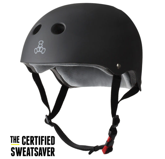 Black Triple Eight bicycle and skate helmet with Sweatsaver fabric, featuring a chin strap and adjustable size straps.